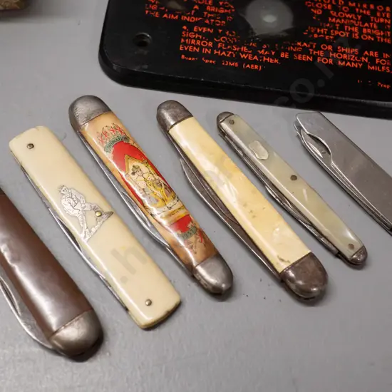 vintage US navy signal mirror, assorted pocket knives including George VI coronation, cased Women's Voluntary Service