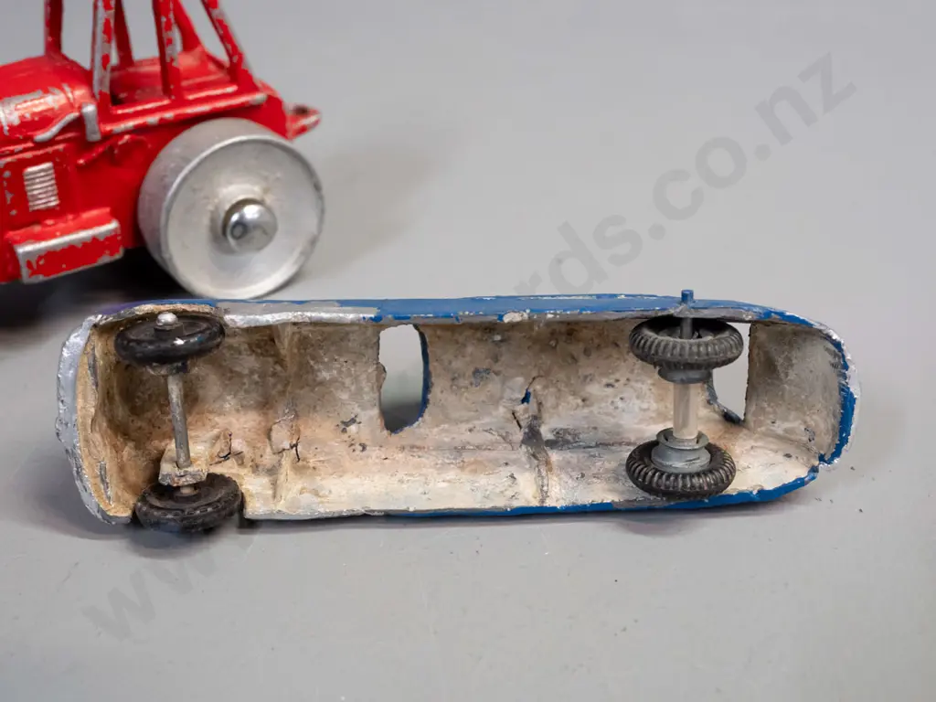 2 small cast metal toy vehicles - road roller marked 413 and symbol that looks like "AB" and a vintage car with black Image 1++