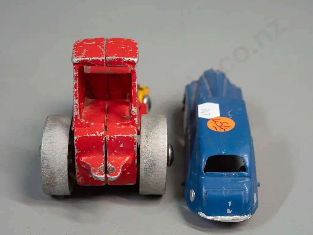 2 small cast metal toy vehicles - road roller marked 413 and symbol that looks like "AB" and a vintage car with black Image 1++