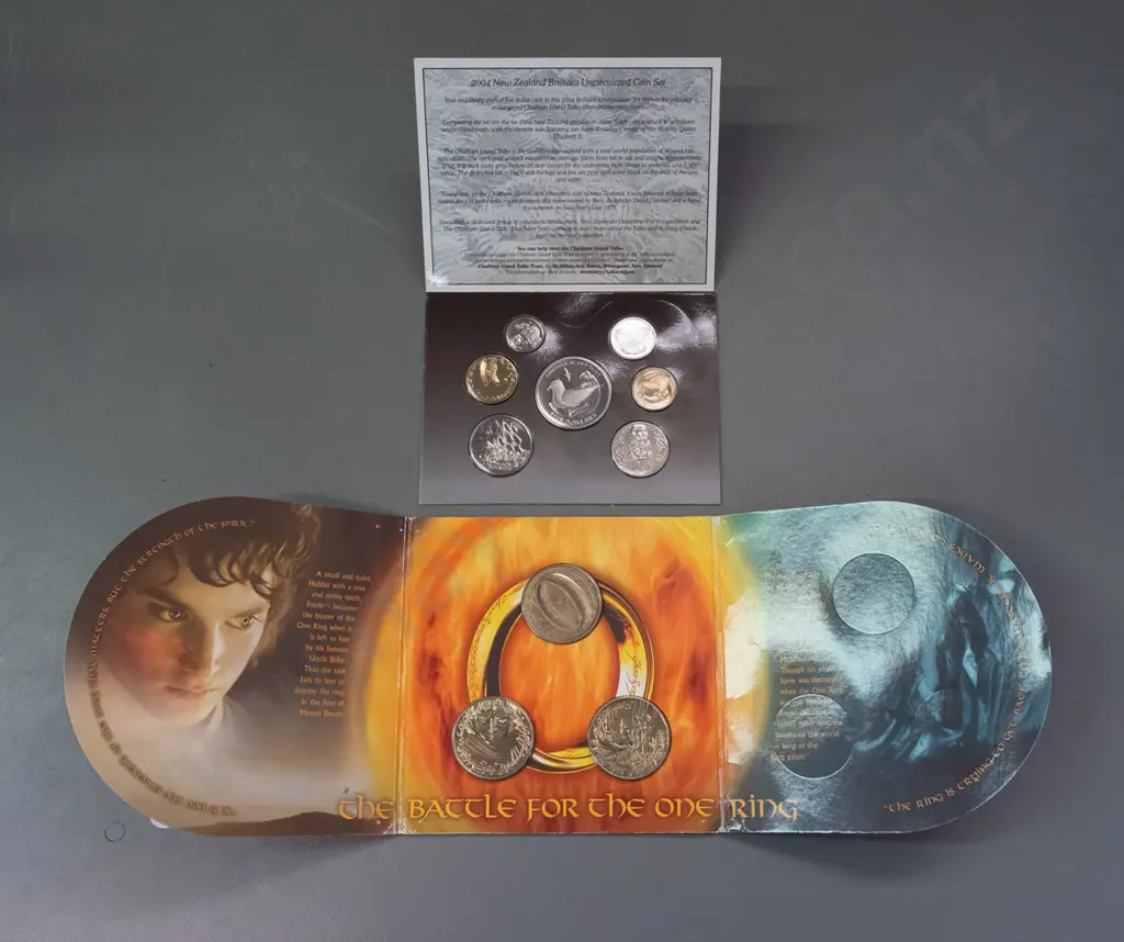 2 New Zealand uncirculated coins sets - 2003 Lord of the Rings set of 3 (minor wear to cardboard) and a 2004 set Image 1++