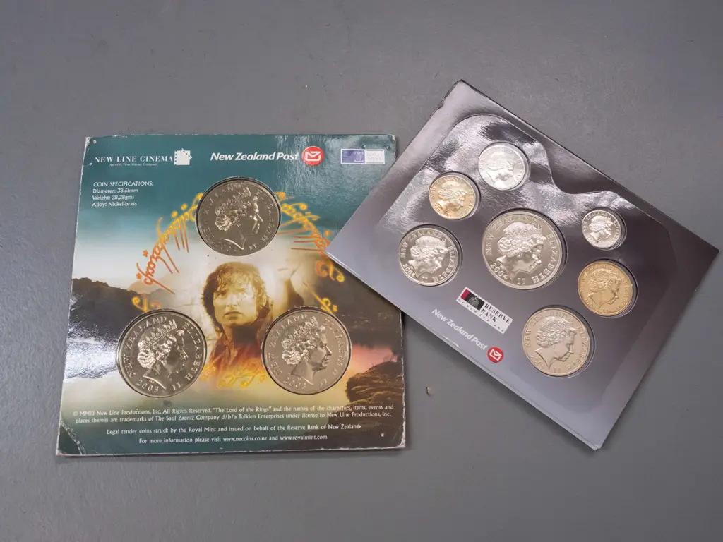 2 New Zealand uncirculated coins sets - 2003 Lord of the Rings set of 3 (minor wear to cardboard) and a 2004 set Image 1++