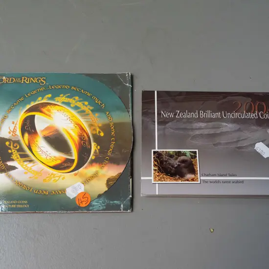 2 New Zealand uncirculated coins sets - 2003 Lord of the Rings set of 3 (minor wear to cardboard) and a 2004 set