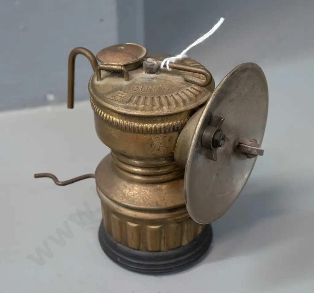 Guy's Dropper carbide miner's lamp - marked Universal Lamp Co. Springfield USA, with rubber bumper around base - minor Image 1++