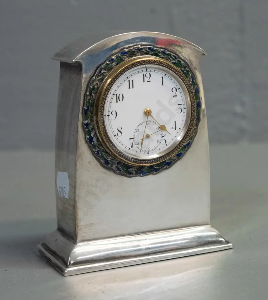 small mantel clock in sterling silver case, enamel band around bezel, brass bezel and porcelain face marked Swiss made Image 1++