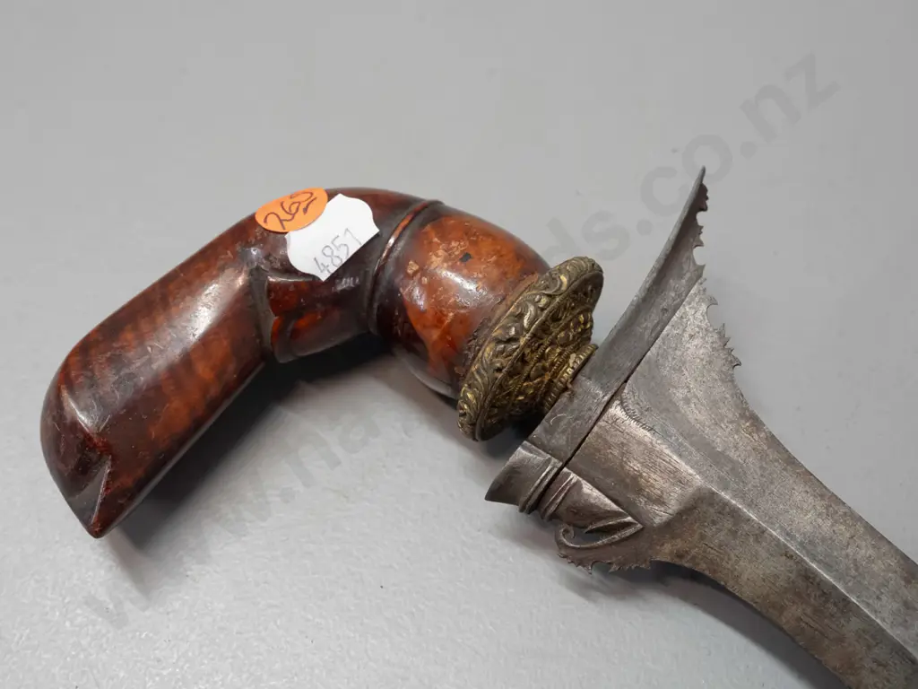 Indonesian Aceh kris with wooden handle, ornate circular brass hilt, intricately detailed shaping to hilt end of blade, Image 1++