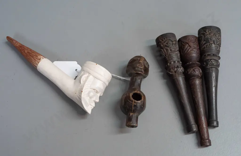 5 smoking pipes - 3 carved wood from Afghanistan, Meerschaum clay and timber figural from Somalia L-180 and a small Image 1++