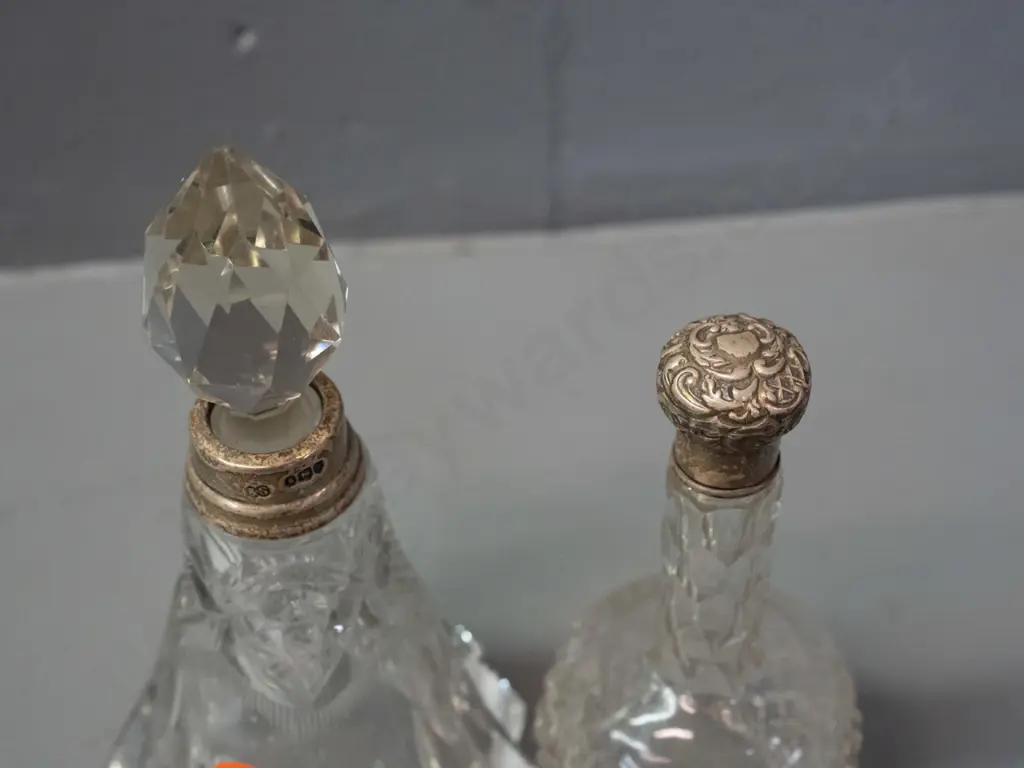 2 cut glass scent bottles, one with sterling silver cap and collar, one with sterling collar H-150 Image 1++