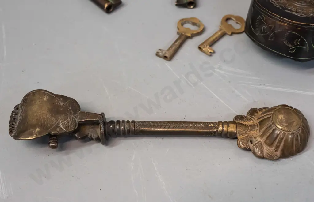 ornate cast metal padlock with 2 keys - working - 2 smaller keys and a figural cast metal ladle or mould with figure on Image 1++
