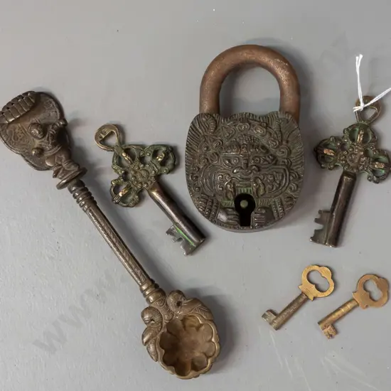 ornate cast metal padlock with 2 keys - working - 2 smaller keys and a figural cast metal ladle or mould with figure on