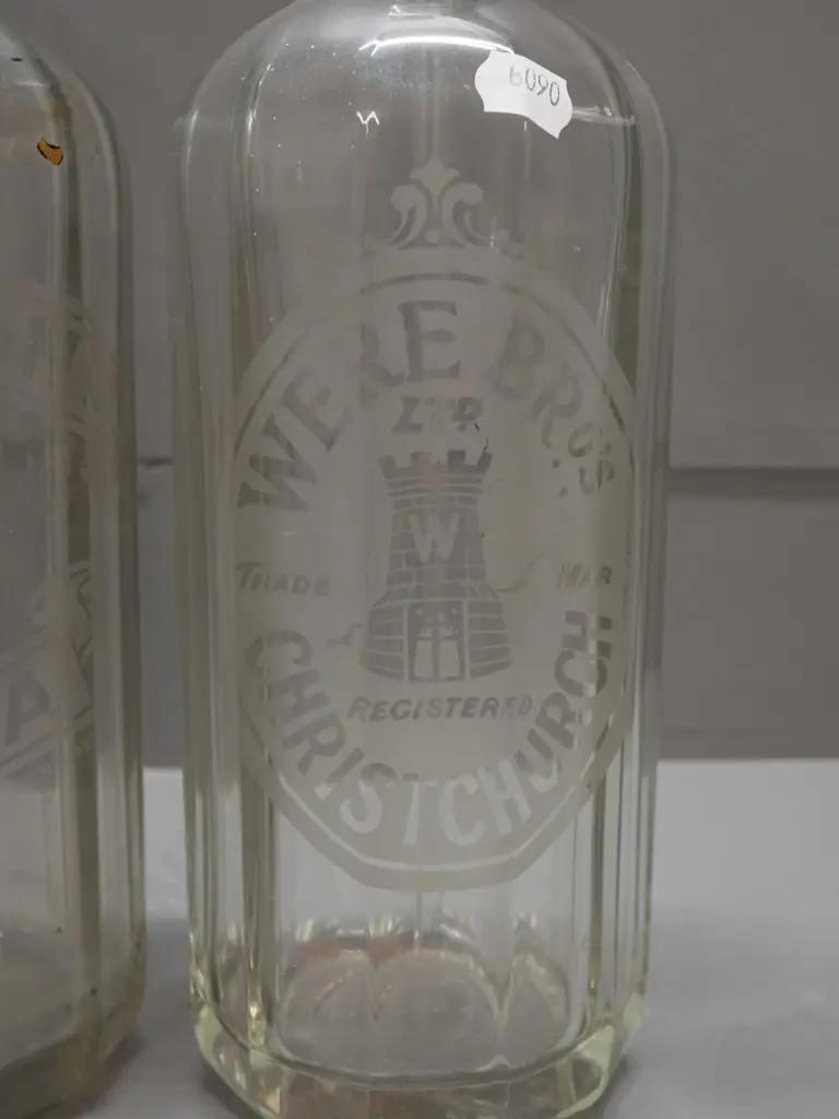 3 soda syphons - etched Were Bros Christchurch, etched Thomsons and an English with woven wire mesh covering H340. Some Image 1++