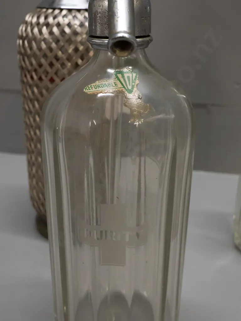 3 soda syphons - etched Were Bros Christchurch, etched Thomsons and an English with woven wire mesh covering H340. Some Image 1++