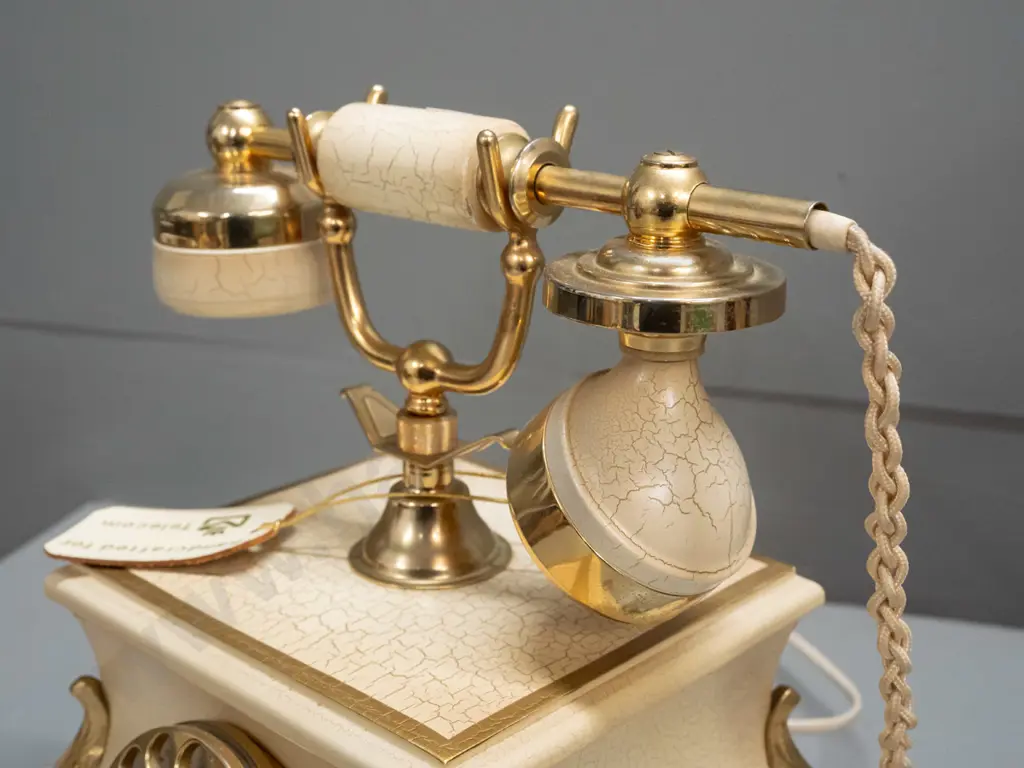 retro 1980s rotary dial telephone with brass finish metal, crackle-finish timber and floral transfers, cast metal feet - Image 1++