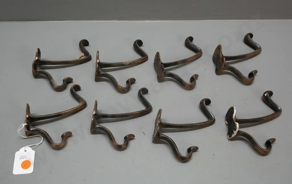 8 vintage cast metal copper finish double coat hooks - some wear and surface corrosion H-110 D-100 Image 1++