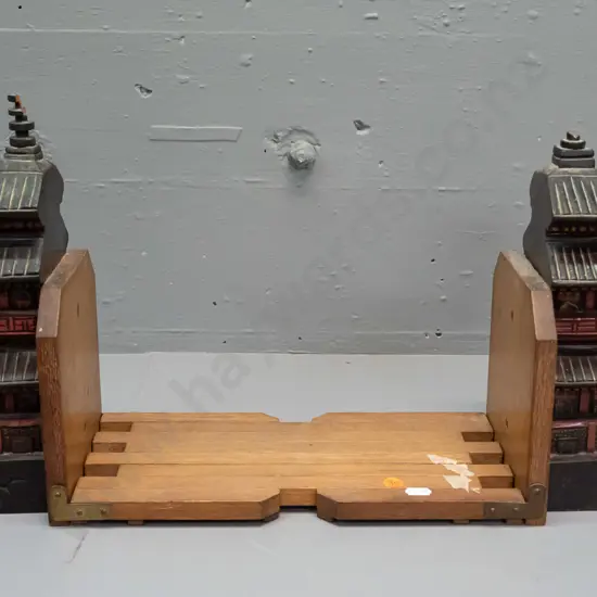 folding and sliding book ends - pagoda motif carved and painted timber ends - damage to both ends, some paint flecks,