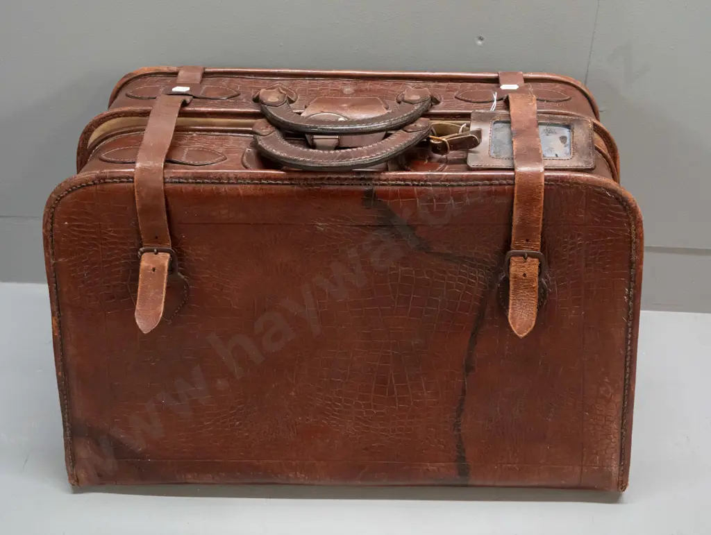 vintage leather suitcase with pressed crocodile skin patterning, canvas lined and fitted interior - some wear to outer Image 1++