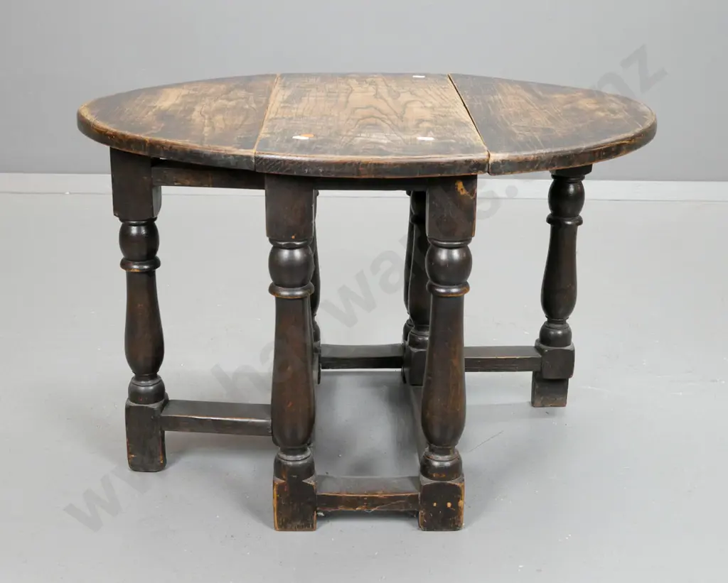 vintage oak small oval gate-leg table on turned bolster shaped legs. Surface wear and scratches to top H-460 L-720 W-550 Image 1++