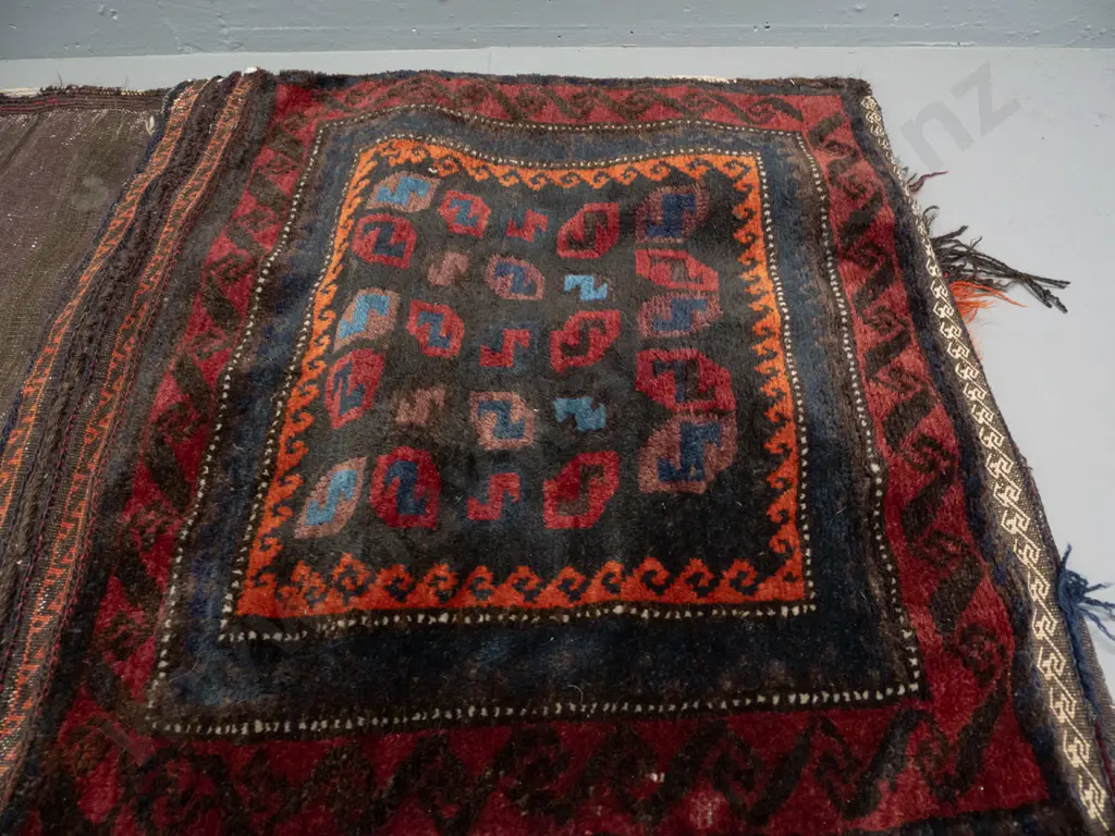 hand knotted wool Persian style saddle bag - geometric pattern dark red, blue, orange etc - most fringing is worn away, Image 1++