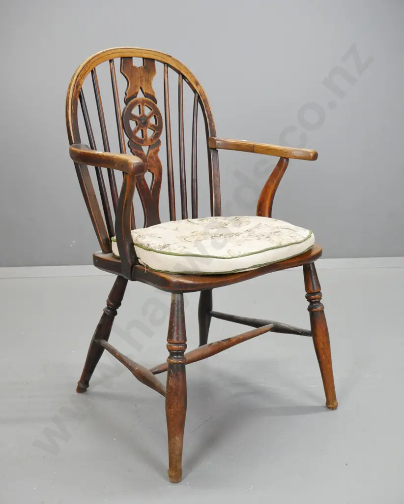 late Georgian oak & elm Windsor wheel-back carver chair with turned legs and stretchers, with loose cushion. Extensive Image 1++