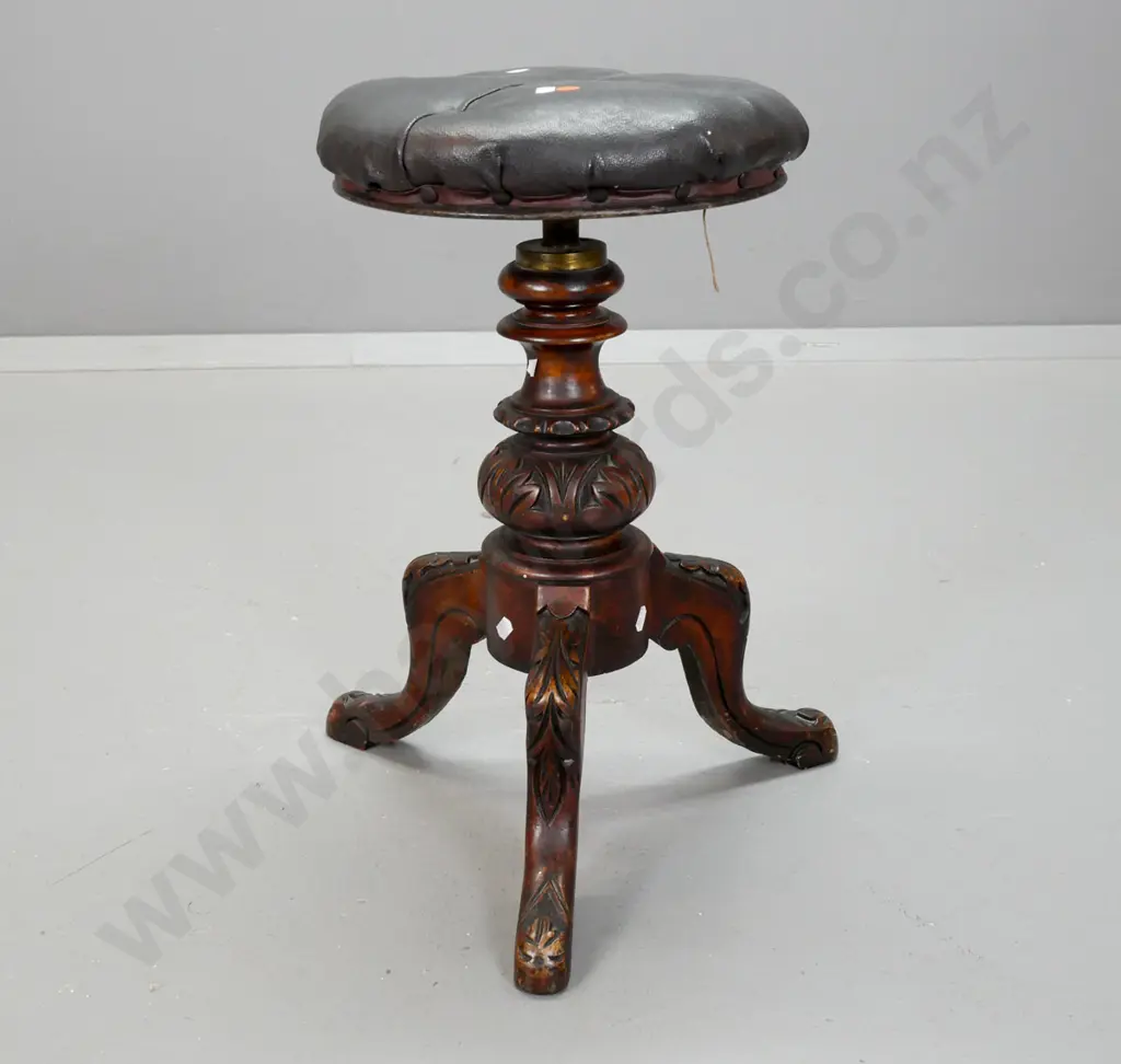 Victorian revolving piano stool with buttoned buckram top, carved pedestal base on 3 sweeping legs, height adjustment Image 1++