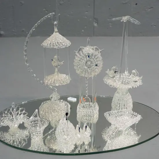 7 spun glass figurines on mirror base - group of swans, hanging bird cage, clock, baskets, etc - tallest is H-175