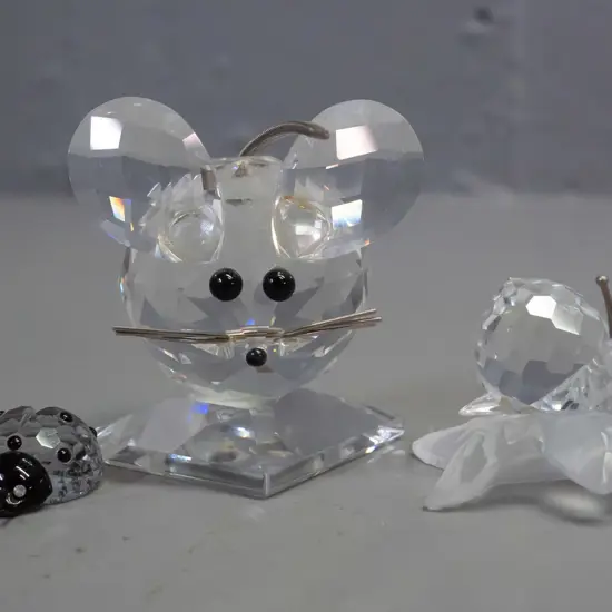 3 small Swarovski crystal ornaments on mirror base - mouse H-65, small ladybird and snail w/frosted leaf base