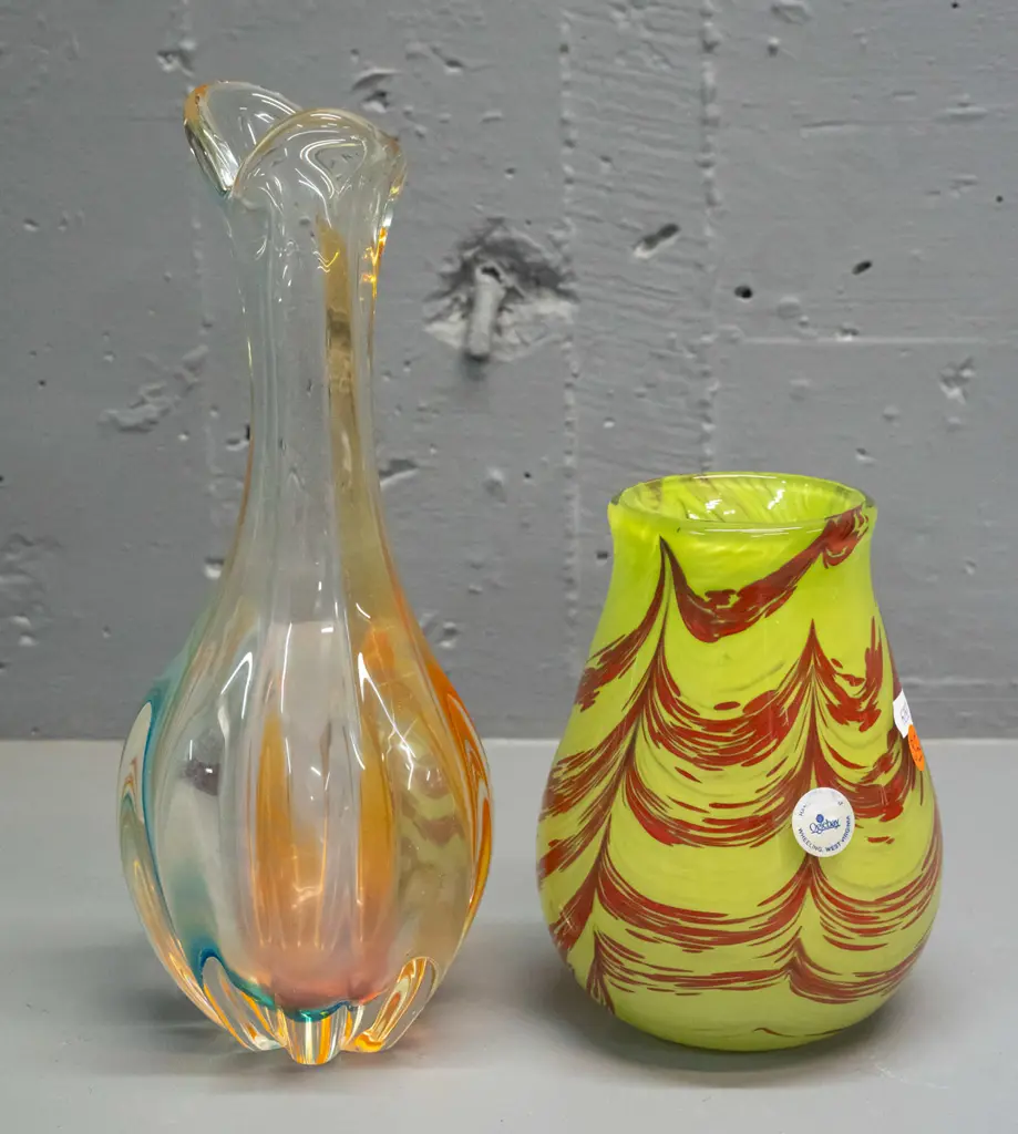 2 pieces of art glass - green and red swirl vase with Oglebay West Virginia label and a fluted bottle vase with light Image 1++