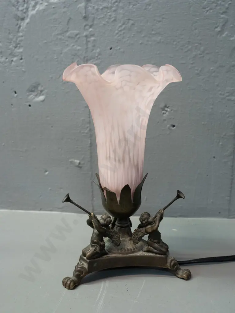 cast metal 3-footed lamp with trumpet-playing cherubs, mottled pink frilled glass shade H-210 - slight bending in places Image 1++