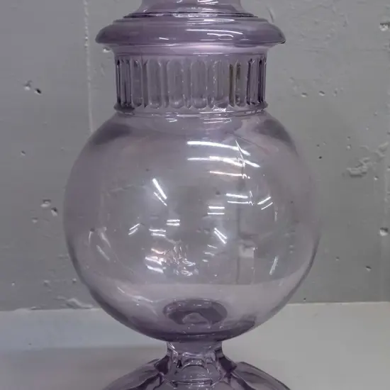large amethyst glass footed lolly jar with apothecary style stopper - some chipping around edge of stopper, some wear &