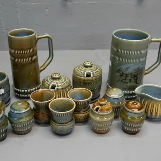 assorted Wade Irish porcelain - two 3-piece condiments, 3 egg cups, cream jug and lidded sugar bowl, etc. Some items are