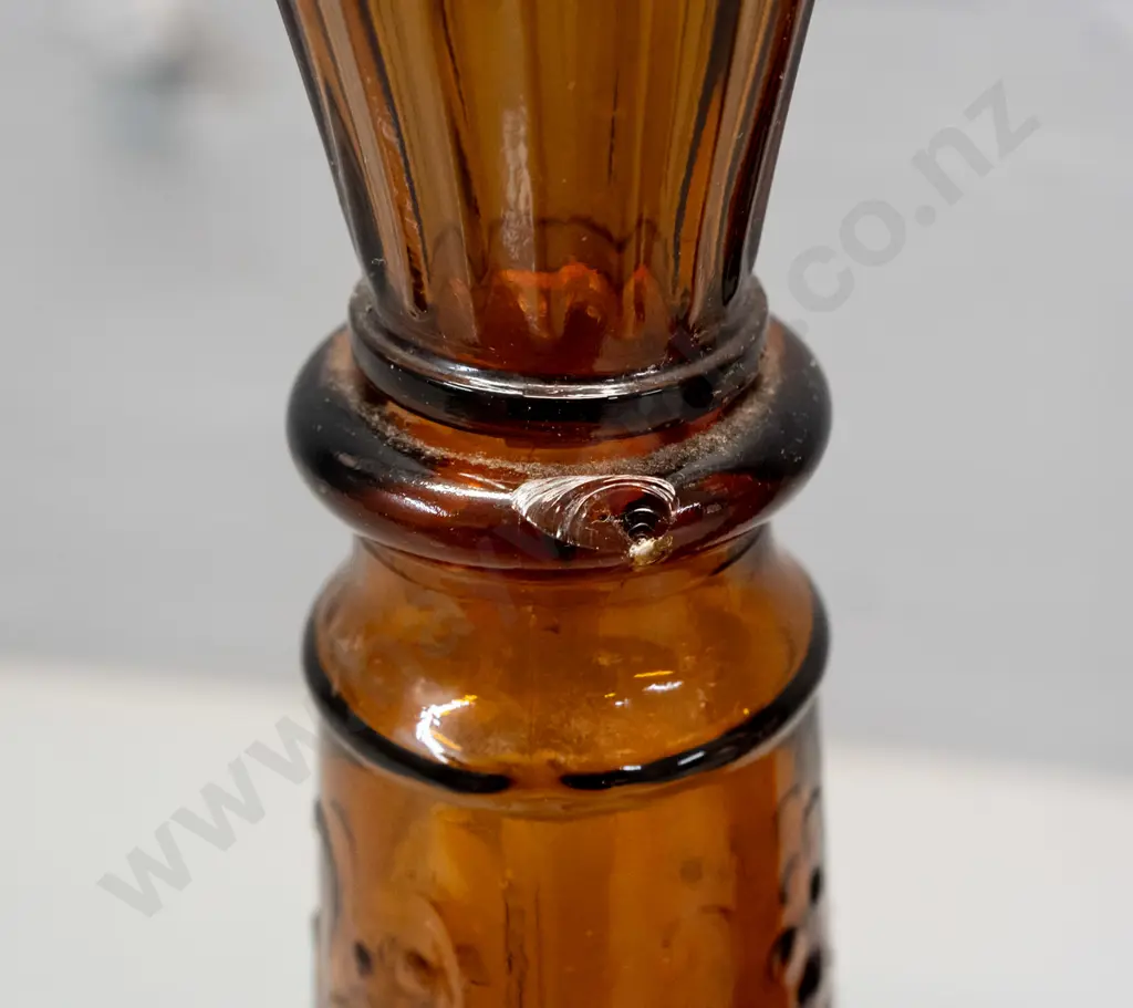 pair of retro moulded amber glass stoppered bottles - marked DABS Portugal on base. One has chip to rim, other has small Image 1++