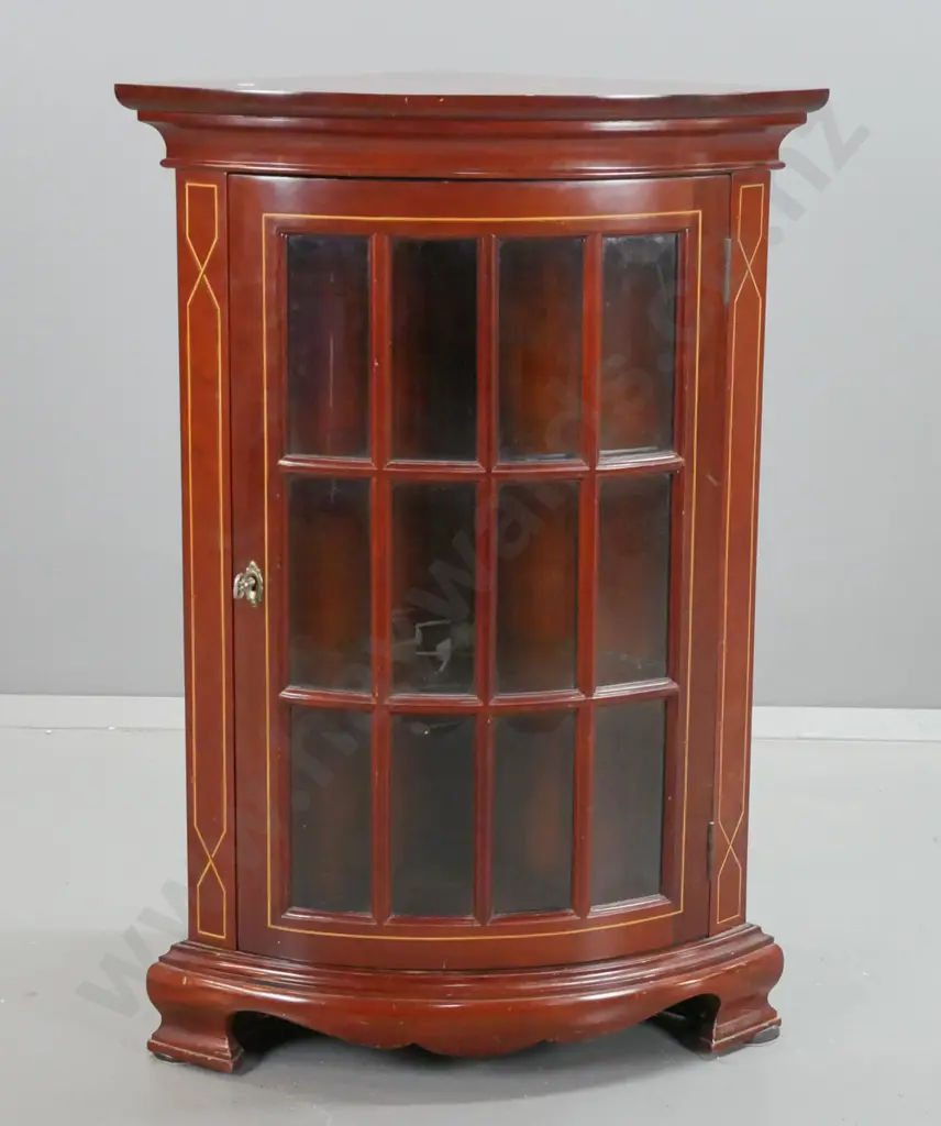 reproduction mahogany corner cupboard with bow-front astragal glazed door with bevelled edge panels, on shaped bracket Image 1++