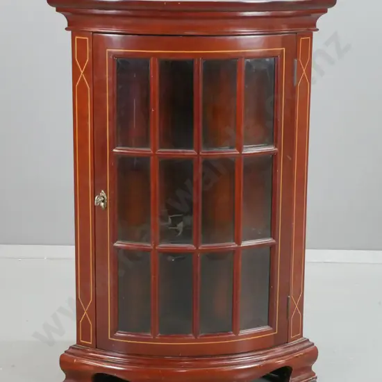 reproduction mahogany corner cupboard with bow-front astragal glazed door with bevelled edge panels, on shaped bracket