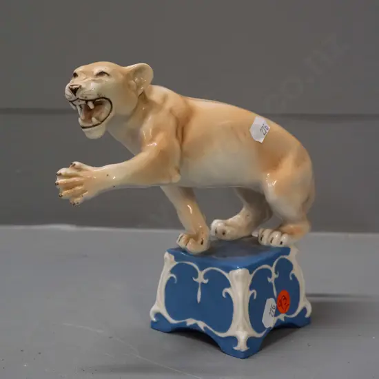 Royal Dux porcelain circus lion on square base H-165