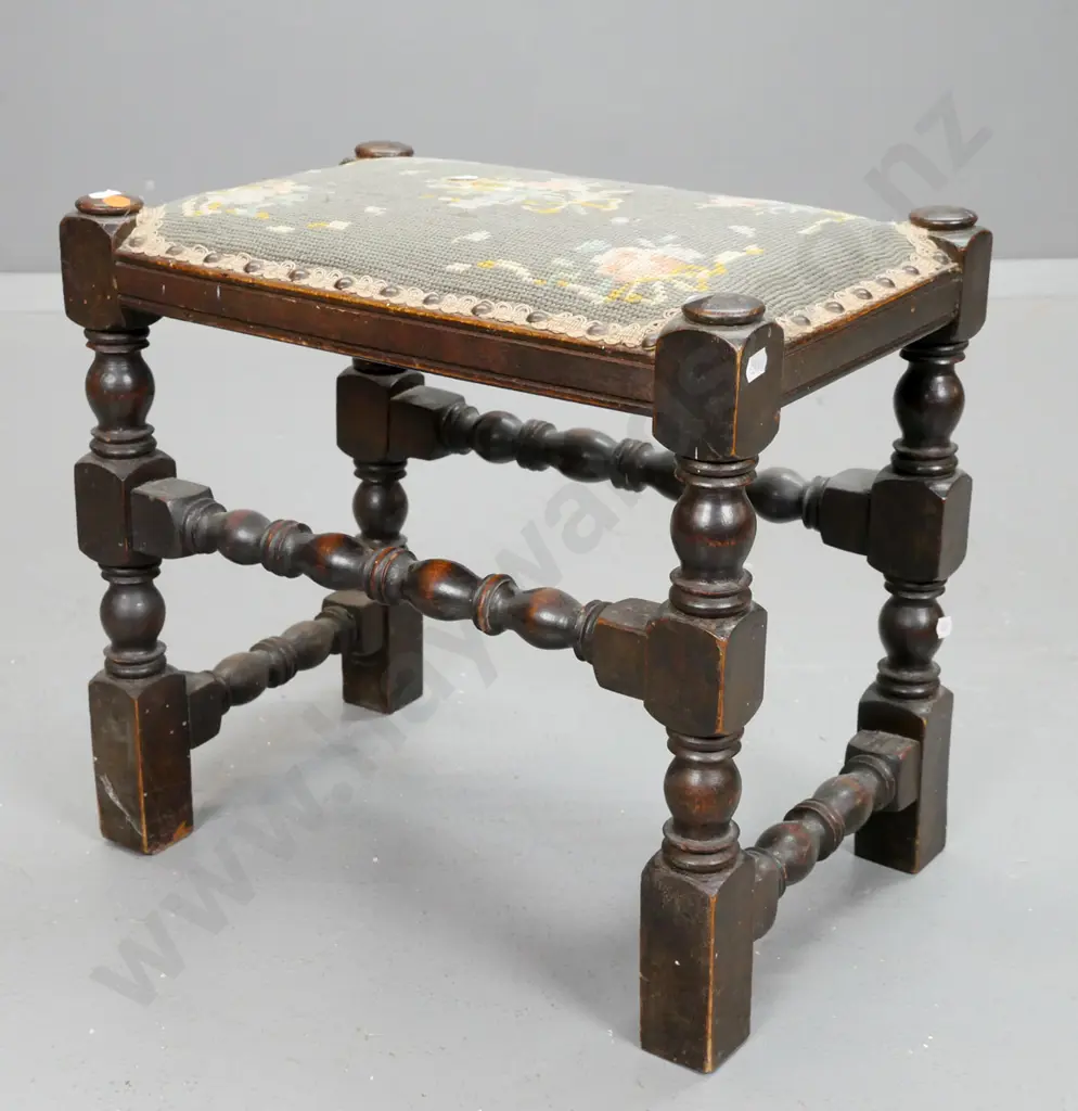 vintage oak tapestry top stool with turned stretchers, turned legs w/block feet. Some borer, some wear & stains to top. Image 1++