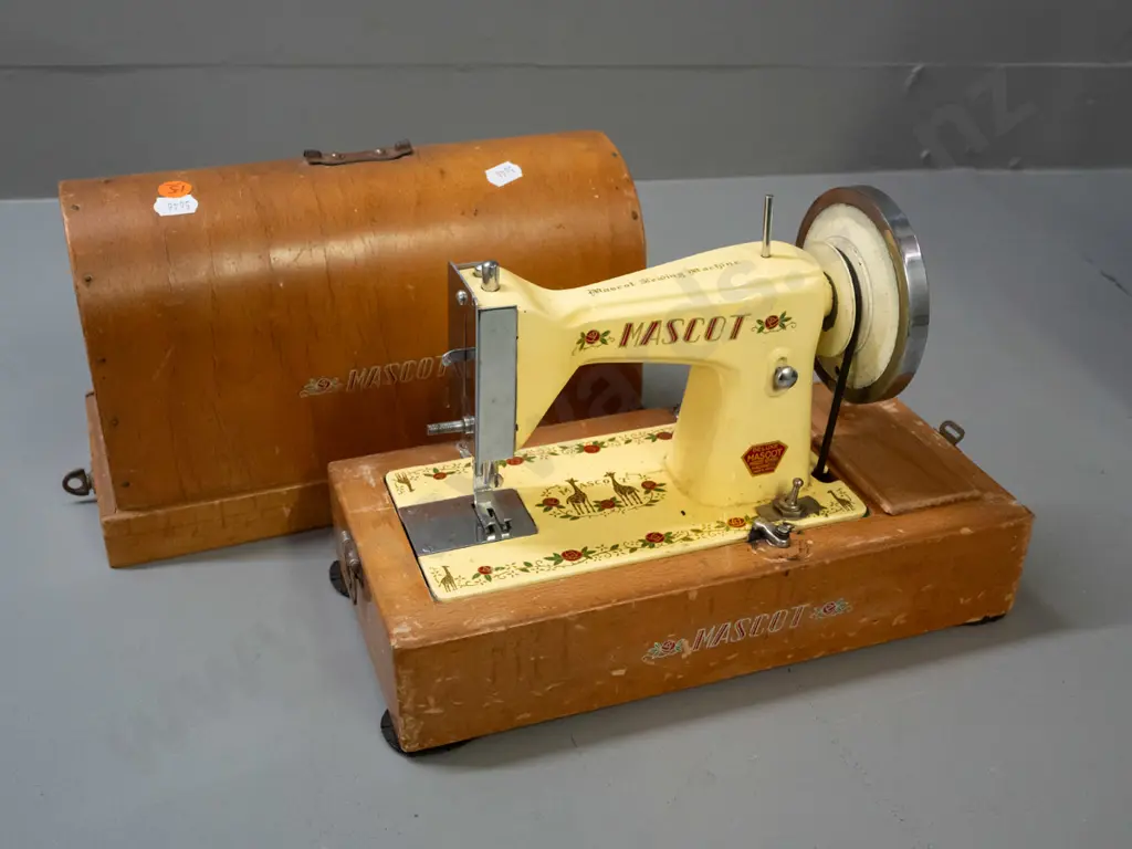 vintage child sized Mascot battery powered sewing machine with wooden dome case - made in Japan - has corrosion and Image 1++
