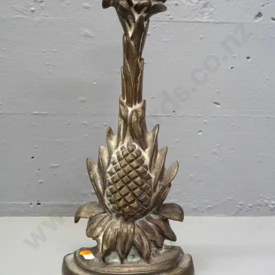 cast brass bracket or ornament, weighted for use as a door-stop H-340 W-150