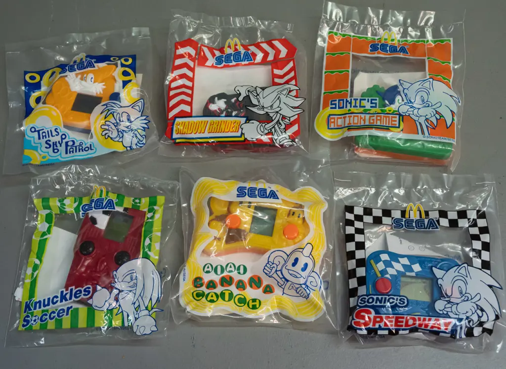 6 Sega Macdonalds Happy Meal mini video games from 2003 - all sealed, untested Image 1++