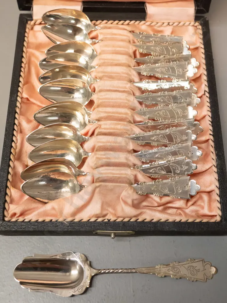 cased set of 12 teaspoons and a sugar scoop - continental sterling silver? Unknown mark, Dutch stamp inside case Image 1++