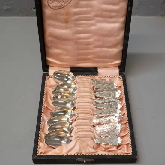 cased set of 12 teaspoons and a sugar scoop - continental sterling silver? Unknown mark, Dutch stamp inside case