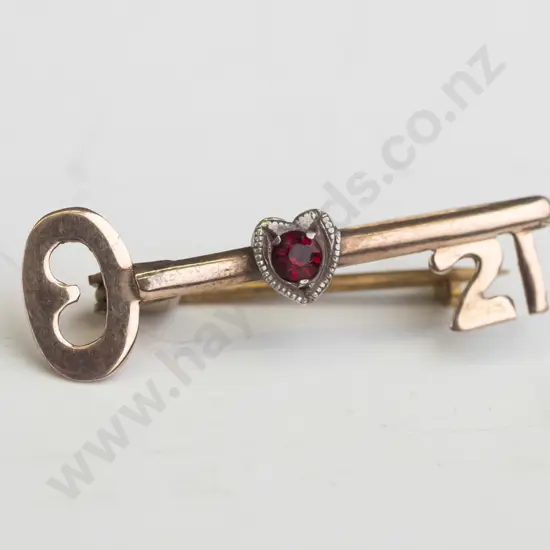 gold 21st key brooch stamped 9ct