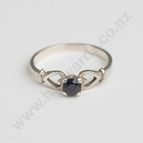 silver ring with dark stone stamped 925