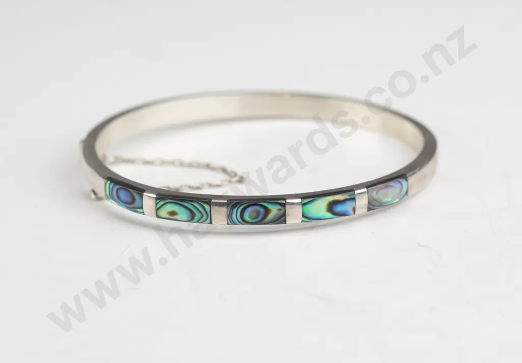 silver bangle with paua shell and safety chain Image 1++
