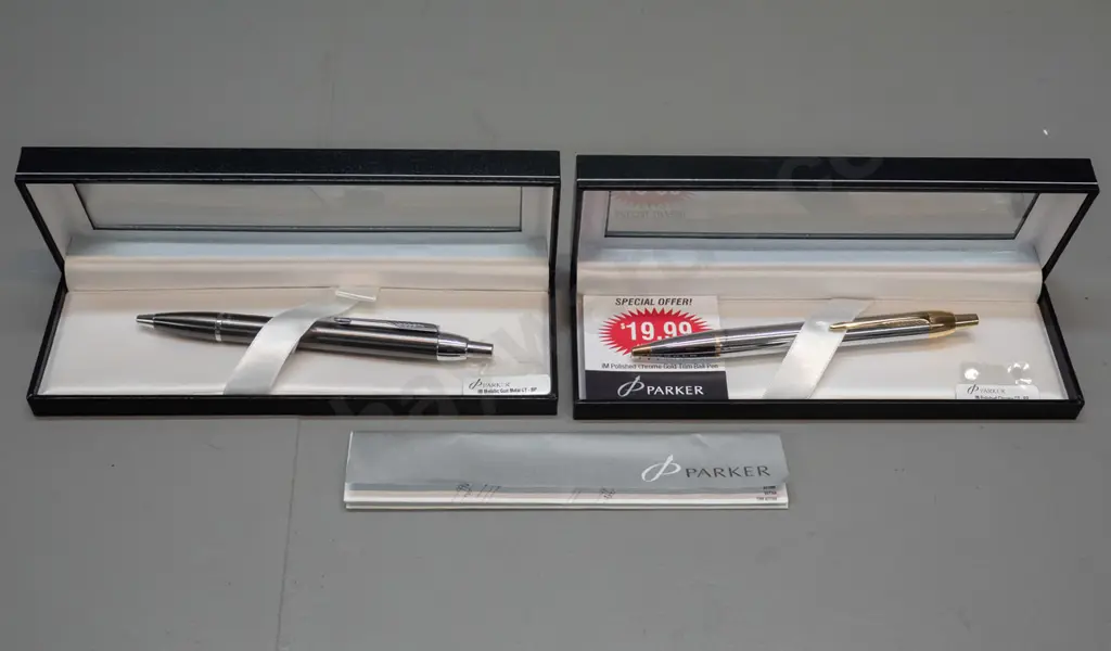 2 boxed Parker "IM" biro pens - one polished chrome and gold, the other Metallic gun metal Image 1++