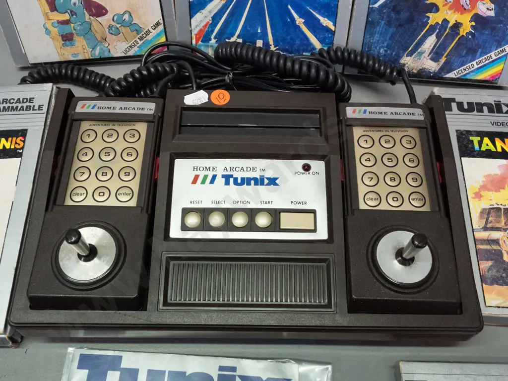 1980s Tunix Home Arcade video game console with 2 controllers, original manual, 6 game cartridges in original boxes - Image 1++
