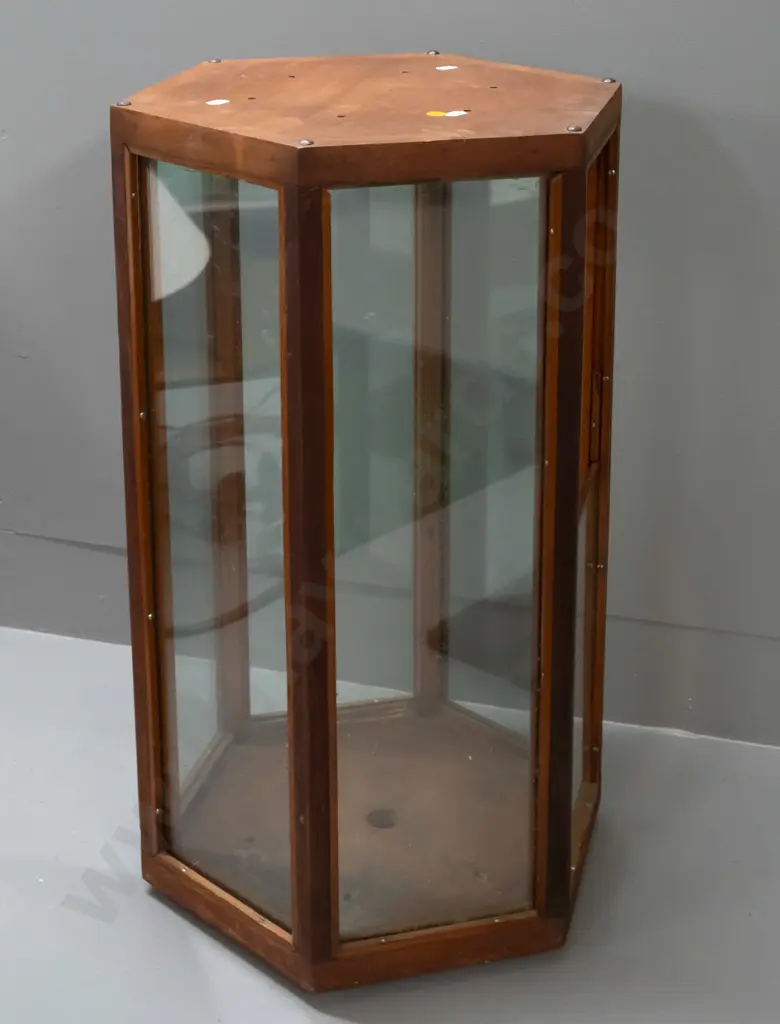 vintage hexagonal glazed timber display case on metal casters, one side has half panel and opening, 6 holes drilled in Image 1++