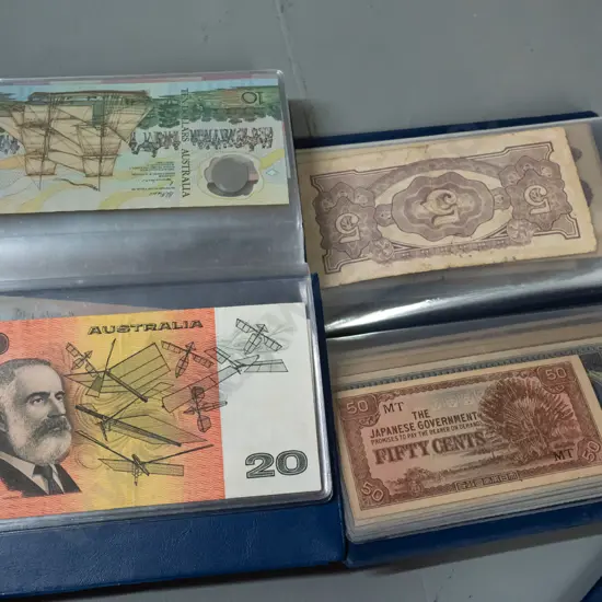 3 bank note collector's wallets - Austraia, Japan, India, Iraq (Saddam Hussein) etc.