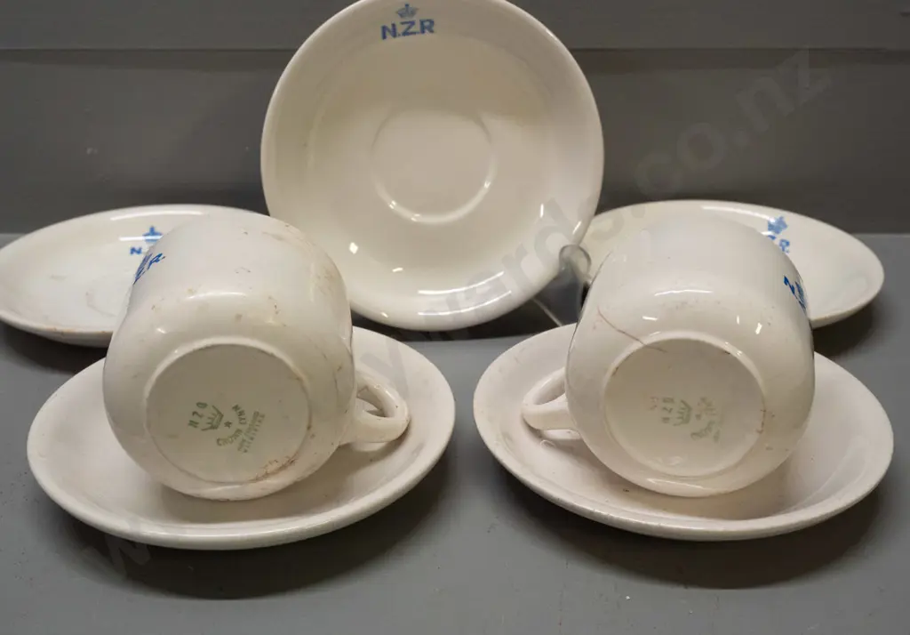 New Zealand Railways logo Crown Lynn crockery - 2 mugs and 5 saucers - staining, chips and cracks Image 1++