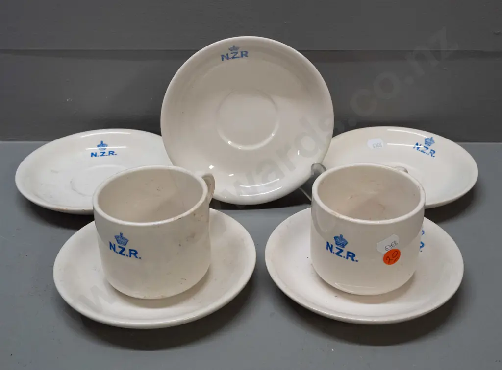 New Zealand Railways logo Crown Lynn crockery - 2 mugs and 5 saucers - staining, chips and cracks Image 1++