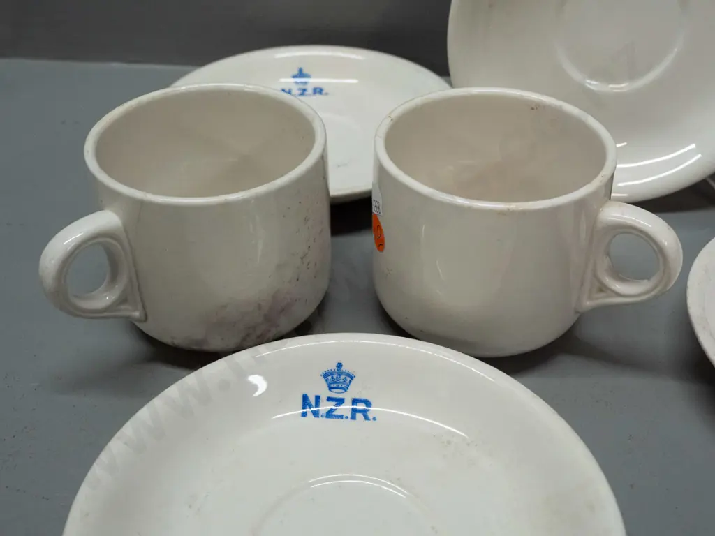 New Zealand Railways logo Crown Lynn crockery - 2 mugs and 5 saucers - staining, chips and cracks Image 1++