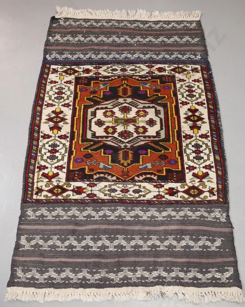 hand knotted Persian style wool floor rug with multi coloured pattern and borders - small dark stain near one edge L1550 Image 1++